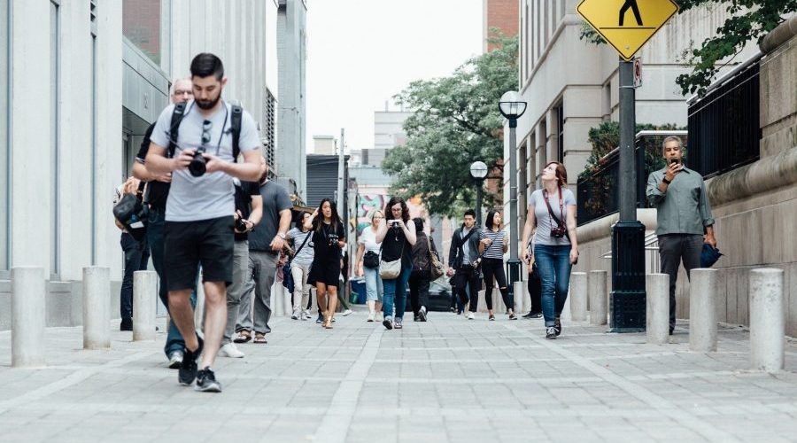 Millennials spurred the growth of ESG investing Pedestrians walking in the street